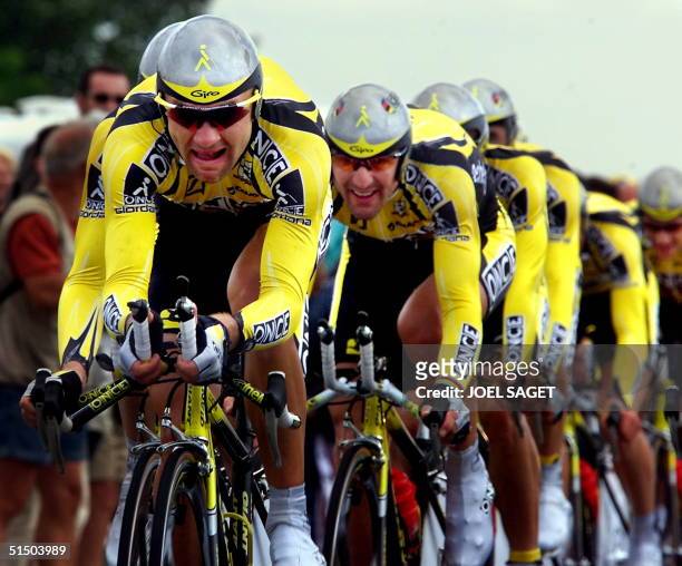 The cyclists of the Once team, with among them Spanish Abraham Olano , ride during the 4th stage of the 87th Tour de France, a 70-km team time trial...