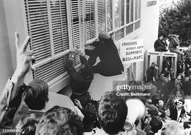 San Francisco, CA- Demonstrators scale wall of Administration Building at San Francisco State College, to break into building, after authorities...