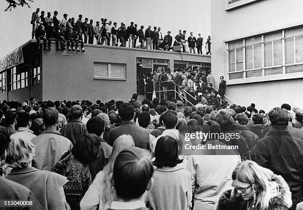 San Francisco, CA- Demonstrators and newsmen cluster around the Administration Building at San Francisco State College, during a demonstration...