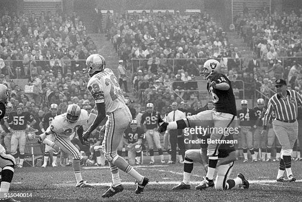 George Blanda of the Oakland Raiders kicks a 40-yard, 2nd quarter, field goal, assisting his club to a 40-7 victory over the Houston Oilers in the...