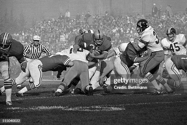 East fullback Larry Csonka, , of Syracuse, makes a tough seven yards through West's line in first period action of 43rd Annual Shrine East-West game...