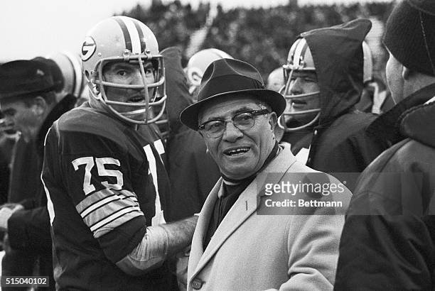 Green Bay Packers coach Vince Lombardi with palyers after defeating the Los Angeles Rams, 28-7 to win the NFL Western Conference play-off.