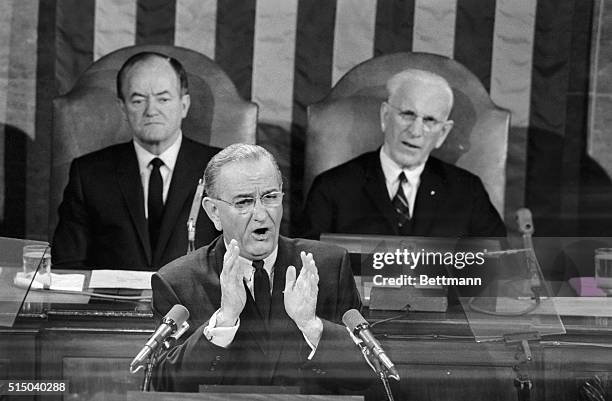 President Johnson gestures as he delivers his annual State of the Union message to a joint session of Congress in the House Chamber 1/17.