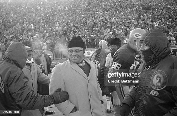 Head Coach Vince Lombardi of the Green Bay Packers is shown on the sidelines during a game against the Dallas Cowboys.