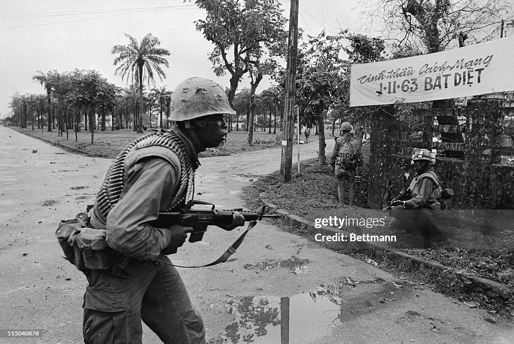 Soldier Walking Cautiously in South Vietnam