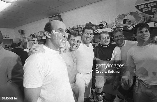 Photo shows the Green Bay Packers as they celebrate winning the NFL Championship against the Dallas Cowboys. Left to right are Max McGee, in back is...