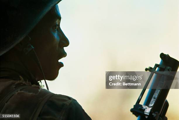 South Vietnamese Ranger in cemetery where he and others fought with Communists for two hours on the fifth day of the countrywide Communist offensive.