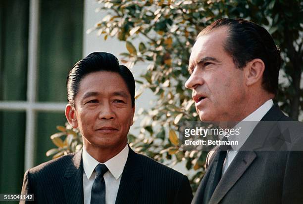 President Richard Nixon bids goodbye to Philippines President Ferdinand Marcos after their White House meeting, 4/1. Marcos and other world leaders...