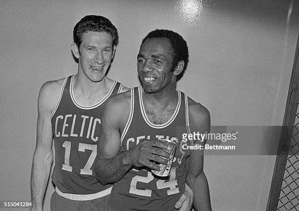 Inglewood, California: Celtics-Lakers. Boston Celtics John Havlicek, , and retiring guard Sam Jones talk to newsmen in locker room after the Celtics...