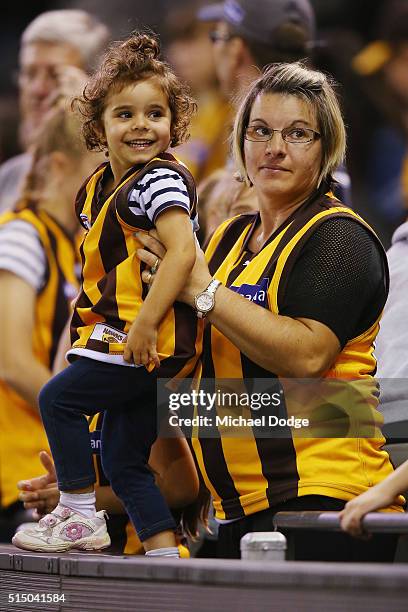 Hawks fans celebrate the win during the NAB CHallenge AFL match between the Hawthorn Hawks and the North Melbourne Kangaroos at Etihad Stadium on...