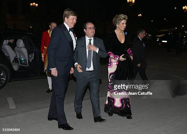 King Willem-Alexander of the Netherlands and Queen Maxima of the Netherlands welcome President of France Francois Hollande to a reception they're...