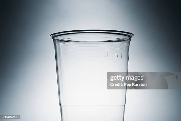 an empty clear plastic cup - disposable cup stock pictures, royalty-free photos & images
