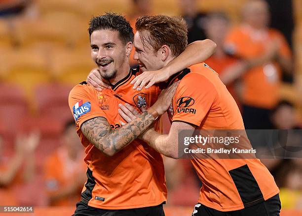 Jamie Maclaren of the Roar celebrates scoring a goal with Corey Brown during the round 23 A-League match between the Brisbane Roar and Melbourne...