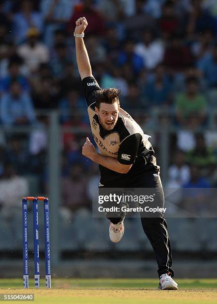 Mitchell McClenaghan of New Zealand bowls during the ICC Twenty20 World Cup warm up match between New Zealand and England at Wankhede Stadium on...