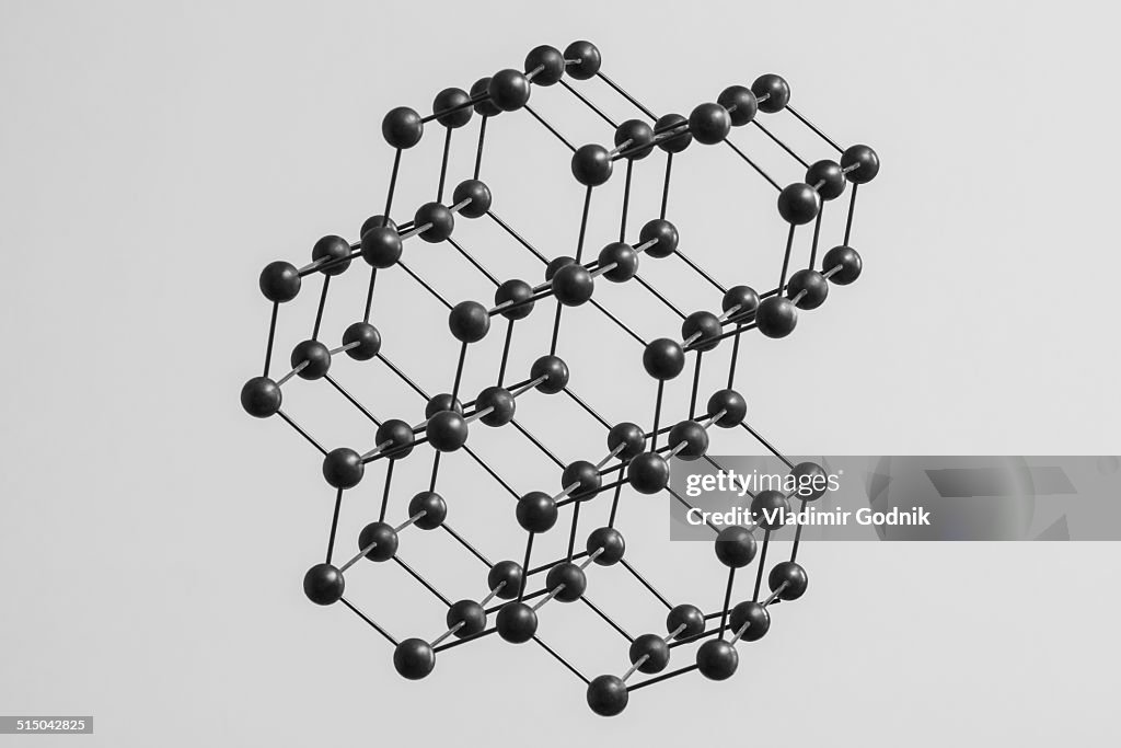 Black molecular structure against white background