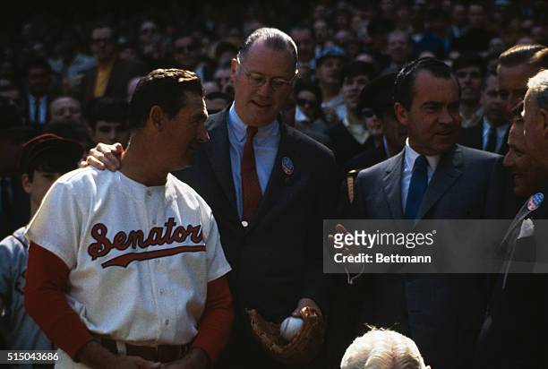 Washington, D.C.: President Richard Nixon makes his way to box in newly named Robert F. Kennedy Stadium to throw out first ball of season to get the...