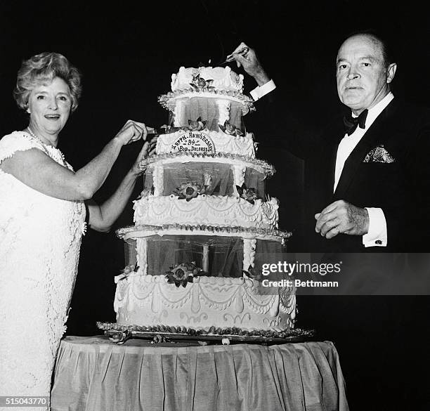 Bob Hope and his wife are given a surprise 34th wedding anniversary cake on February 27th at the annual Parkinson Bob Hope dinner. Bob serves as...