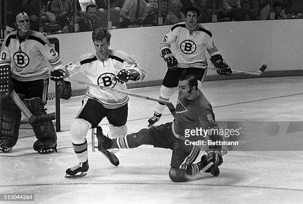 St. Louis Blues' Bob Plager trips Boston Bruins' Bobby Orr in the second period of Blues-Bruins Stanley Cup game, 5/5. Plager received a two-minute...