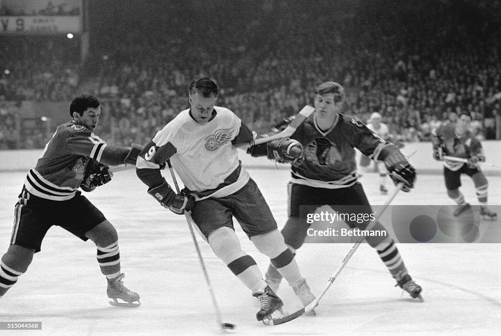 Gordie Howe Surrounded by Black Hawk Players