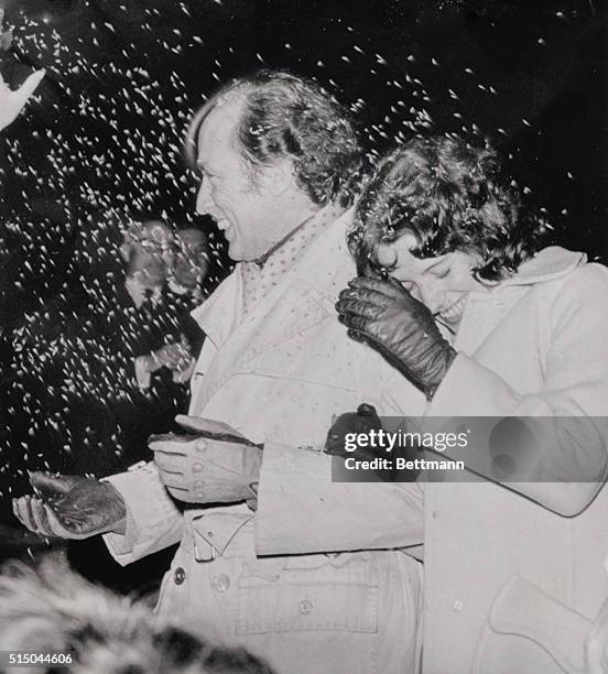 Canadian Prime Minister Pierre Elliot Trudeau and his bride, the former Margaret Sinclair, leave the Sinclair home, March 4, in a shower of rice...