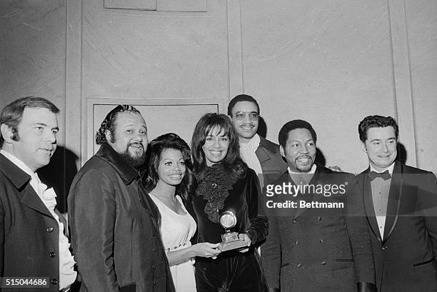 The 5th Dimension received their Grammy award for best contemporary vocal performance of "Aquarius Let the Sunshine In". The award went to Ron...