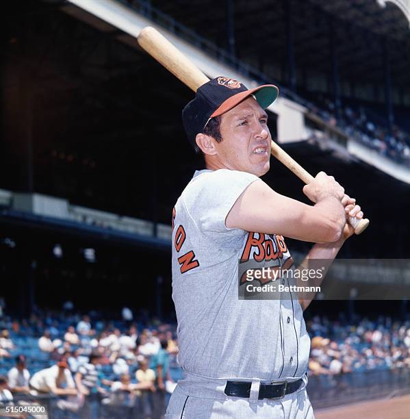 Brooks Robinson, infielder for the Baltimore Orioles shown holding a bat.