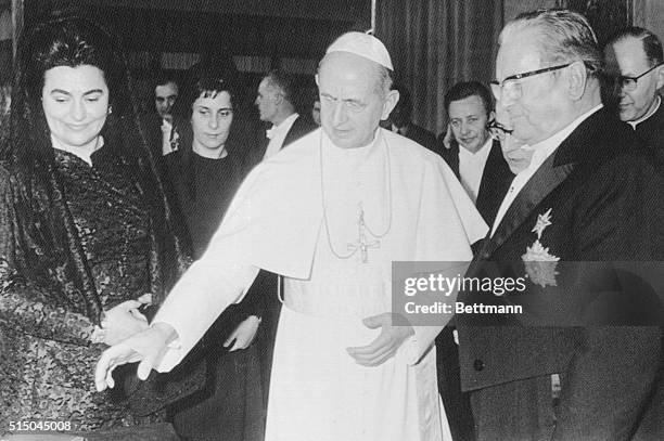 Have audience with pope. Vatican City: Pope Paul VI talks with Yugoslavian president Tito and his wife, Jovanka, during their private audience with...