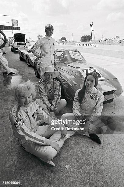 The all-girl racing team from Ring Free Motor Oil pose in front of their prototype Austin Healey before taking on the grueling 12 Hours of Sebring....