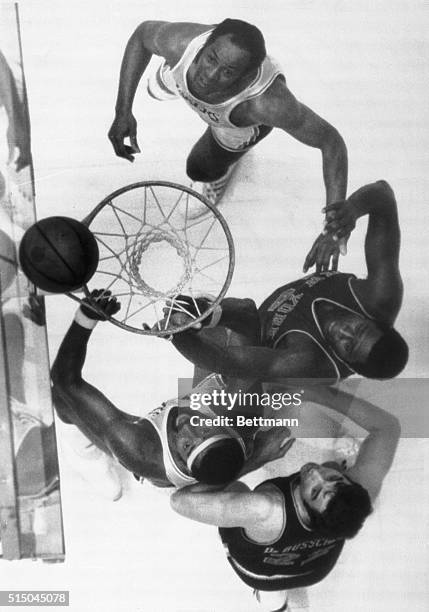 Inglewood, California: Elgin Baylor and Wilt Chamberlain of the Lakers and Willis Reed and Dave Debusschere of the Knicks all watch the ball bounce...
