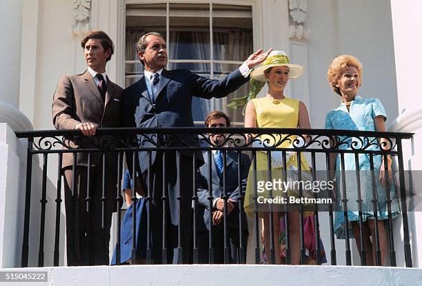 President and Mrs. Nixon welcome Prince Charles and Princess Anne on the balcony of the South Portico of the White House here. Left to right are...