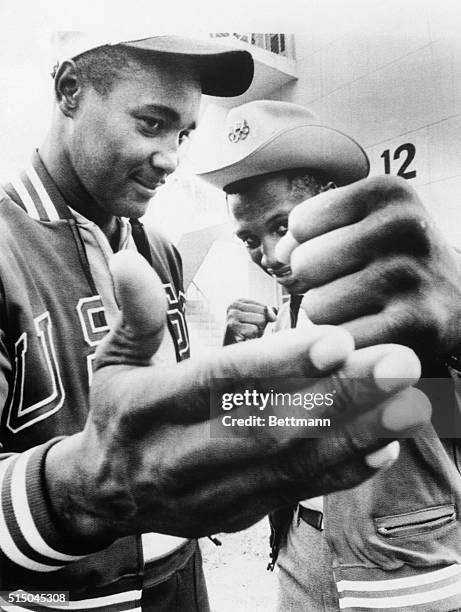 American heavyweight judoist George Harris , scheduled to compete in judo events and heavyweight boxer, Joe Frazier, slated for the boxing final...