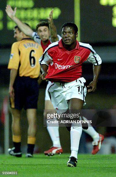 Arsenal's Lauren Bisan-Etame of Cameroon runs to the crowd after scoring the first goal against Liverpool during their premiership match at Highbury...