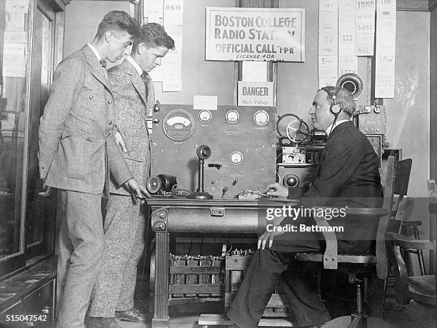 Father Lynch of Boston College, broadcasting from the station recently installed at Boston College, issues a radio invitation to all police chiefs...