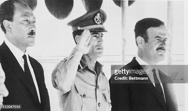 Three Arab heads of state: President Anwar Sadat of the UAR, Premier Lt. Col. Muammar al-Qaddafi of Libya and President Lt. Gen. Hafez al-Assad of...
