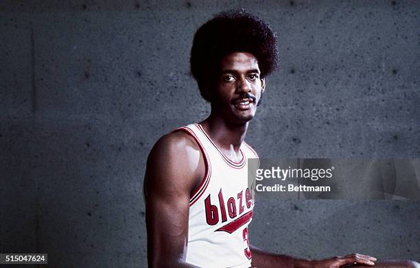 Close up of LaRue Martin, basketball player for the Portland Trailblazers in his uniform. Undated color slide.