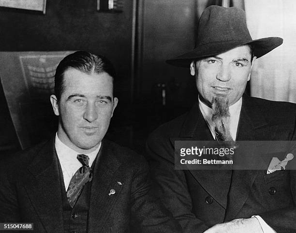 Jack Dempsey, wearing the accoutrements of the southern gentleman, is seen with Ltd. Governor "Happy Chandler, in Louisville, Kentucky. After his...