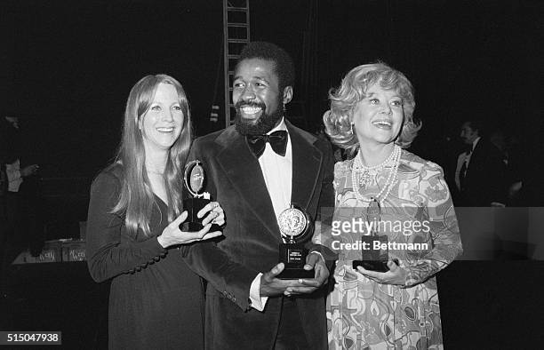 They're Real "Tony" New York: Julie Harris , Ben Vereen and Glynis Johns beam happily as they hold Broadway Theater's Tony Awards presentation here....