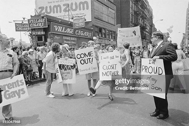 Parents march in support of LGBTQ rights at Gay Pride parade in Greenwich Village, New York City, US, 30th June 1974; is American lawyer Dick...