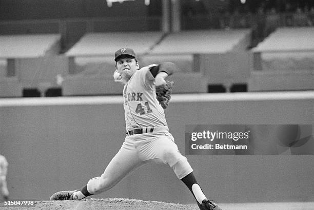 Tom Seaver of the New York Mets bears down against the Cincinnati Reds in the first game of the National League playoff, as shown here. Seaver helped...