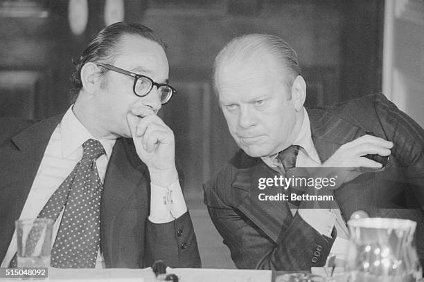 President Gerald Ford huddles with Alan Greenspan, the new Chairman of the Council of Economic Advisers, at the White House on September 5, 1974....
