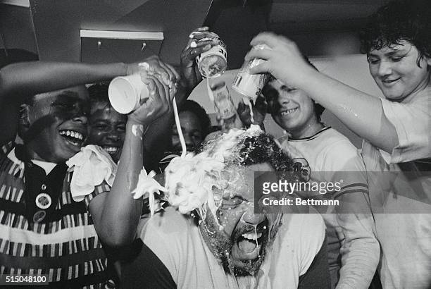 Oakland: Oakland Athletics outfielder Reggie Jackson is doused with beer, champagne, and squirted with shaving cream after the A's won the 5th World...