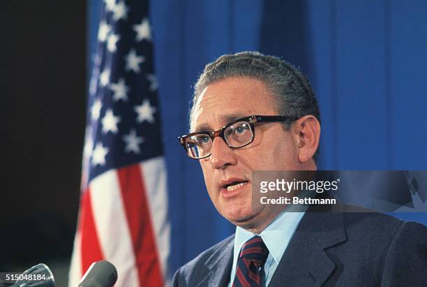 Secretary of State, Henry Kissinger is shown in his first news conference.
