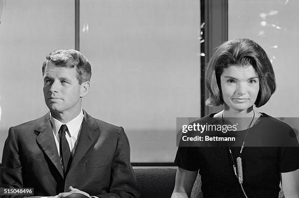 Hyannisport, Mass.: Mrs. Jacqueline Kennedy appears excited as she establishes voice contact with British Prime Minister Harold MacMillan during...