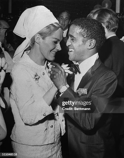 Gotham Galaxy. High-voltage smiles light the faces of Sammy Davis, Jr., and Tammy Grimes as they dance at the Richard Burton party. Tammy is...