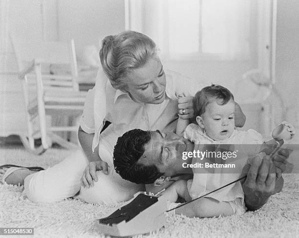 Gina Martin, 7-months old, joins her lovely mother, Jeanne, and her dad, Dean, motion picture and tv star, for her first family photo session. Gina...