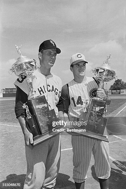 The 1963 "Rookies of the Year" get together with trophies almost as big as they are during presentation ceremony prior to White Sox-Reds exhibition...