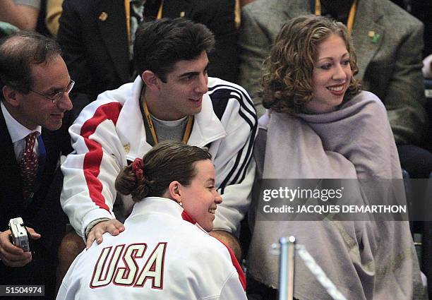 First daughter" Chelsea Clinton watches the Olympic Women's individual foil fencing preliminaries 21 Septemebr 2000, with foil fighter Ann Marsh and...
