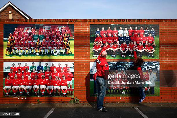 Bournemouth supporters arrive at the stadium prior to the Barclays Premier League match between A.F.C. Bournemouth and Swansea City at Vitality...