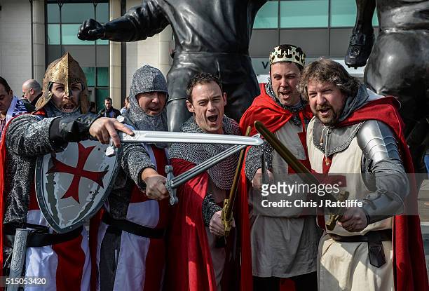 England rugby fans Alan Rosten, Simon Smith, Colin Clark, Will Littleboy and Neil Carter arrive at Twickenham stadium dressed as English Knights...