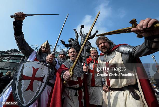 England rugby fans Alan Rosten, Simon Smith, Colin Clark, Will Littleboy and Neil Carter arrive at Twickenham stadium dressed as English Knights...